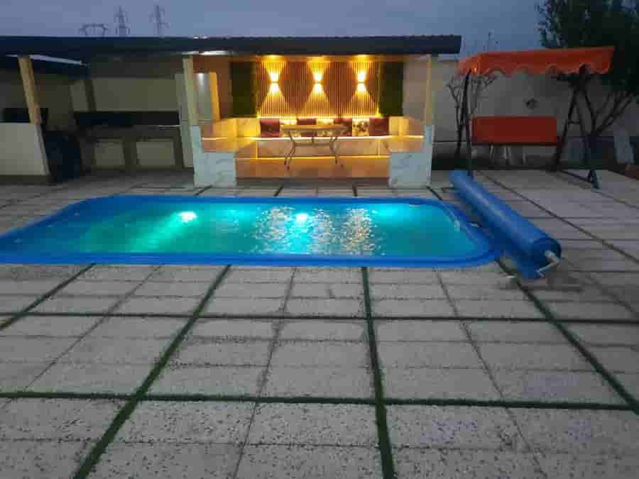 عکس کلبه سوئدی با استخر روباز آبگرم در بهشهر